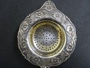 ORNATE TEA STRAINER FLORAL EMBOSSING