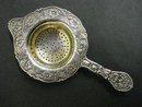 ORNATE TEA STRAINER FLORAL EMBOSSING
