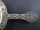 ORNATE TEA STRAINER FLORAL EMBOSSING