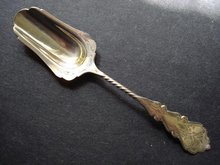 SMALL VICTORIAN STERLING CHEESE SCOOP