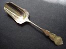 SMALL VICTORIAN STERLING CHEESE SCOOP