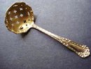 STERLING SUGAR SIFTER LADLE - MONOGRAM V