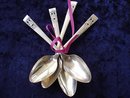 FOUR TINY SILVER COFFEE SPOONS-CORONATION