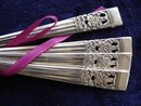 FOUR TINY SILVER COFFEE SPOONS-CORONATION