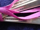 FOUR TINY SILVER COFFEE SPOONS-CORONATION