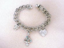 VINTAGE STERLING SILVER CHARM BRACELET