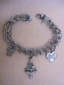 VINTAGE STERLING SILVER CHARM BRACELET