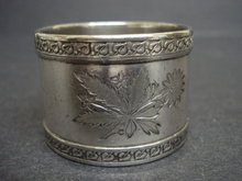 ANTIQUE NAPKING RING - FLORAL ENGRAVINGS