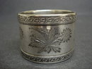 ANTIQUE NAPKING RING - FLORAL ENGRAVINGS