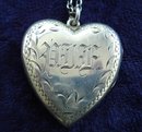 ANTIQUE STERLING LOCKET MONOGRAMS