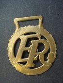 Antique Horse Brass E R