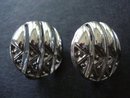 Clip Earrings by Monet Silver Tone