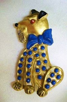 Early Plastic Brooch Dog