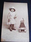 Real Photo Postcard Tiny Girl w/ Windmill Toy