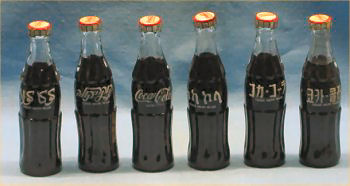 Coca Cola Miniature Foreign Bottles and Crate