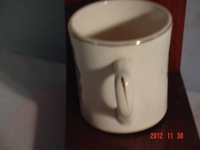 Raggedy Ann Cup, Crooksville Pottery