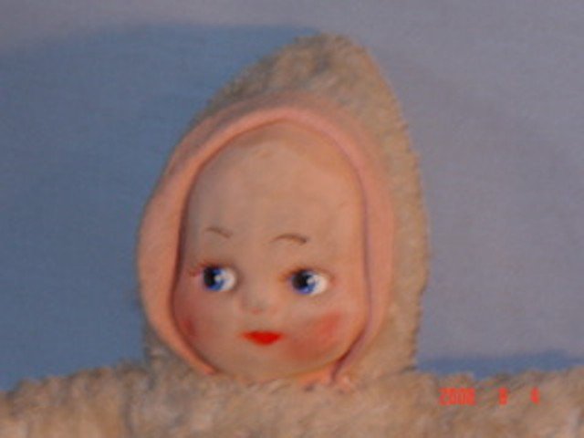 Kuddle Kewpie, 12
