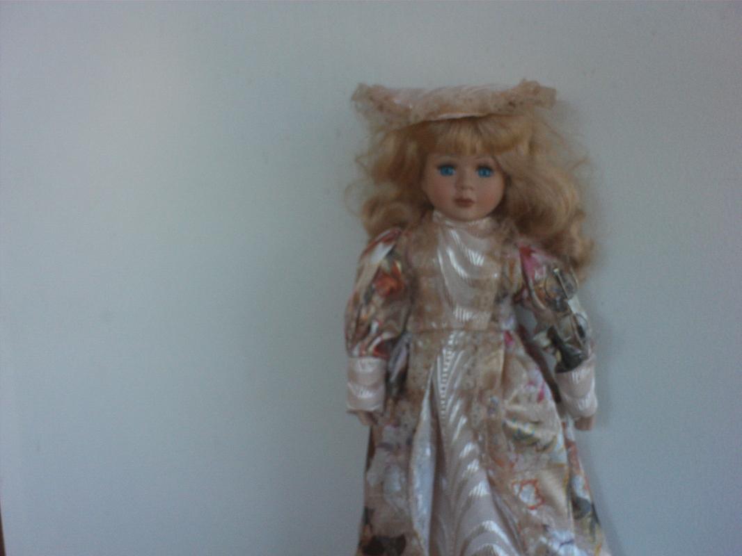 16 inch tall Bisque porcelain doll