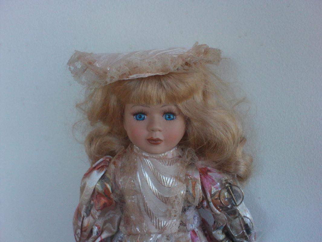 16 inch tall Bisque porcelain doll