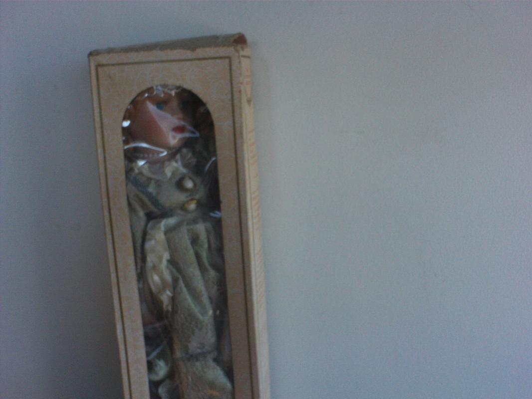 16 inch tall Bisque porcelain doll