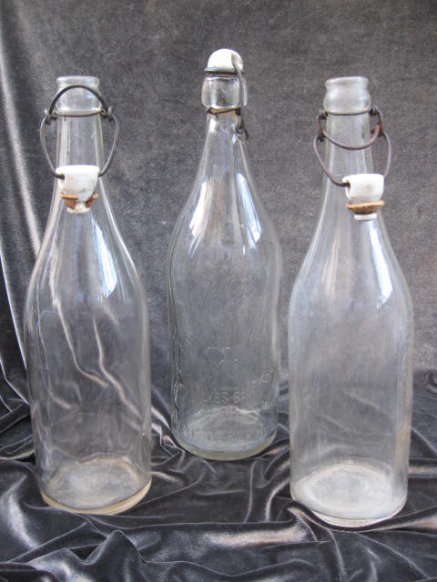 3 Vintage Glass Bottles With Ceramic Stoppers
