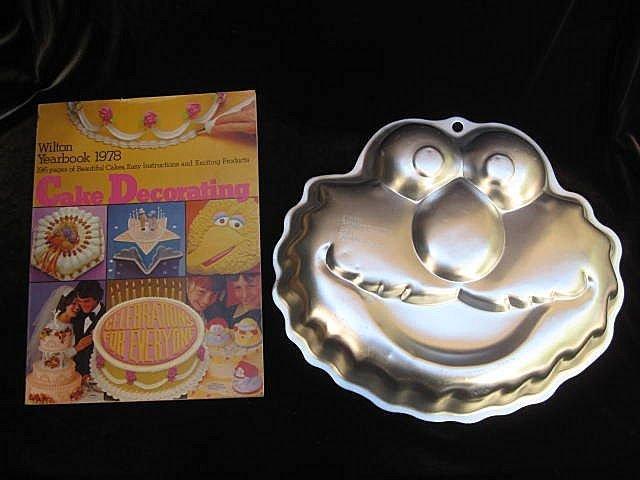 Lot of 6 Sesame Street Cookie Cutters, Wilton Elmo Cake Pan & Wilton 1977 Yearbook