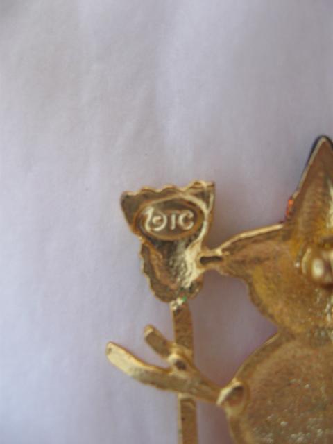 OTC Christmas Winter or Halloween Orange Snowman Brooch
