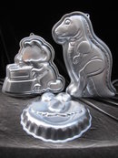 3 Wilton Cake Pans Elmo , Garfield, T Rex Dinosaur Care Pans