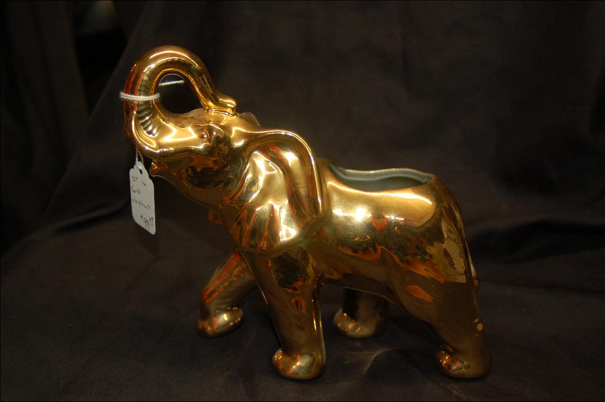 gold decorated pottery elephant