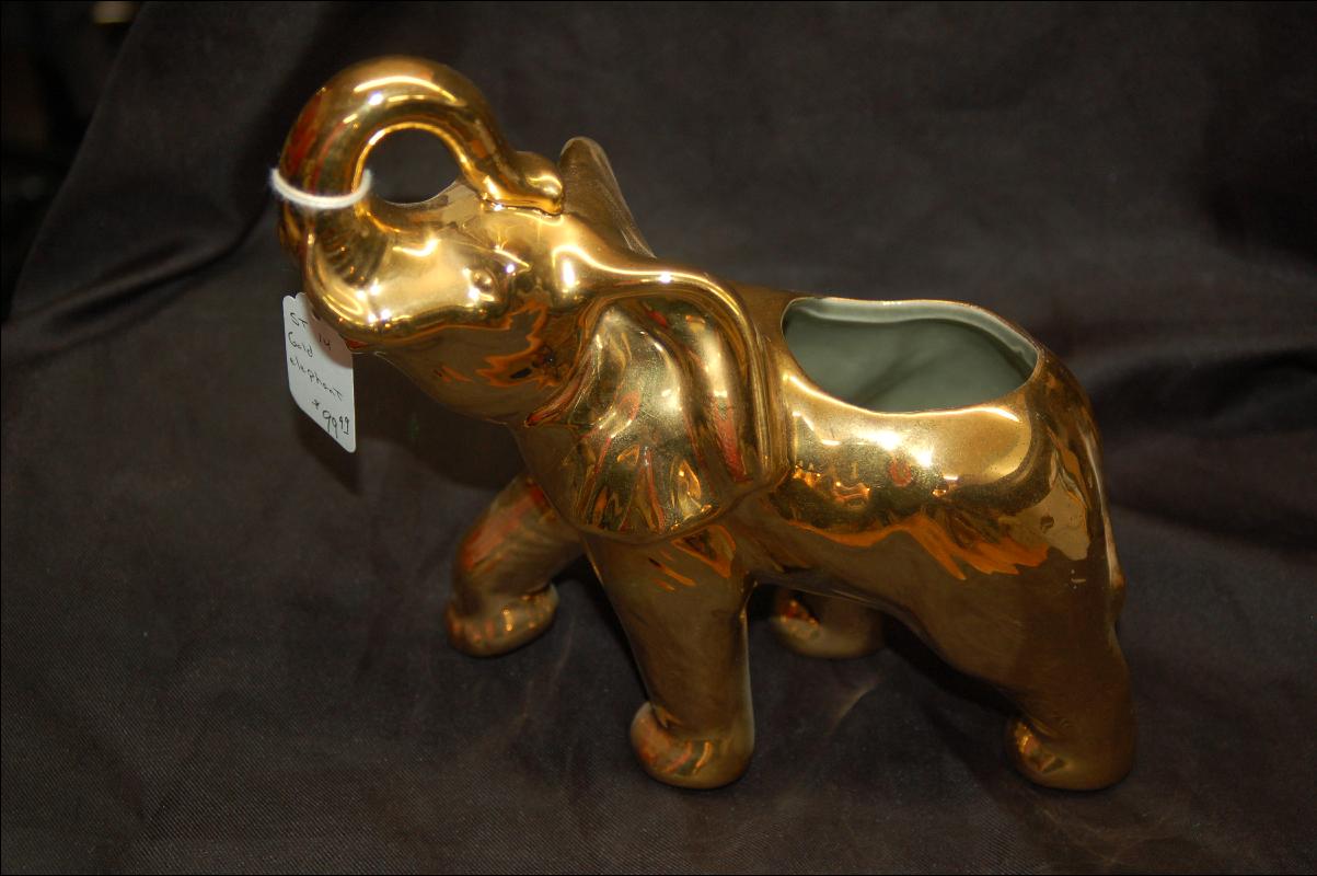 gold decorated pottery elephant