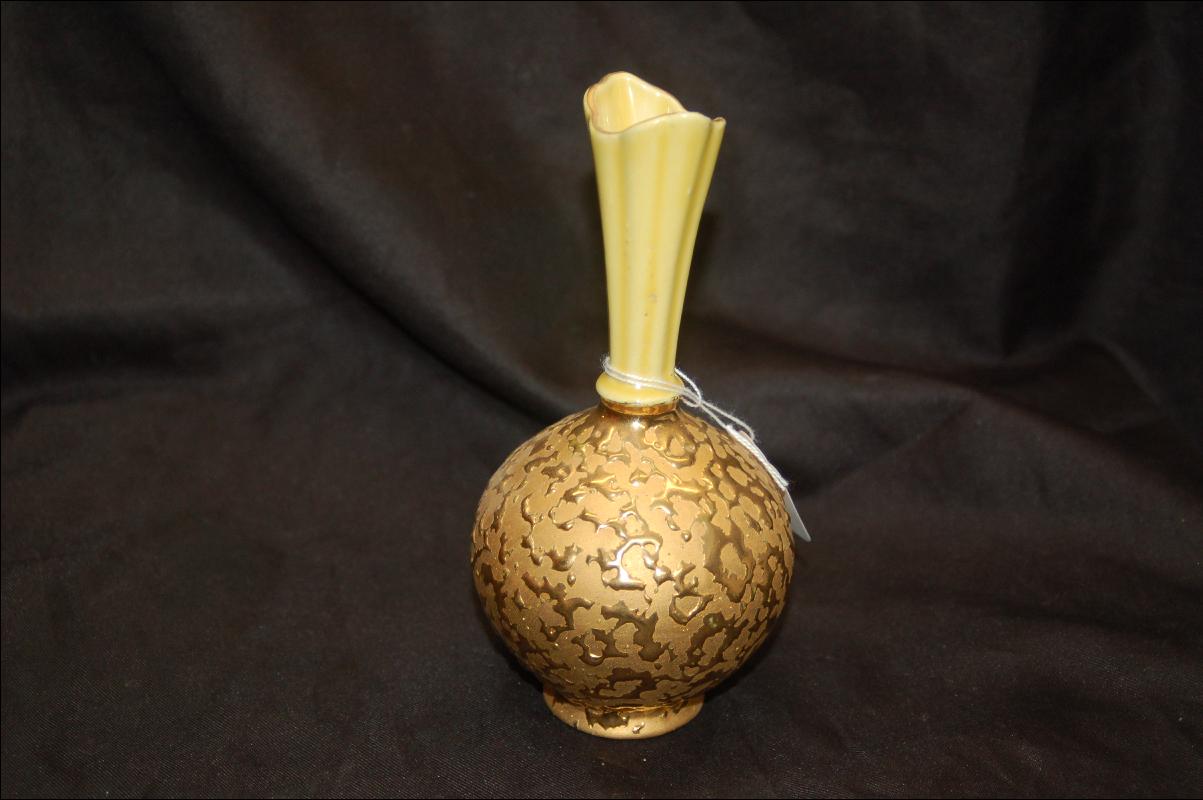 gold decorated bulbous bottom pottery vase