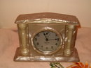 Celluloid alarm clock