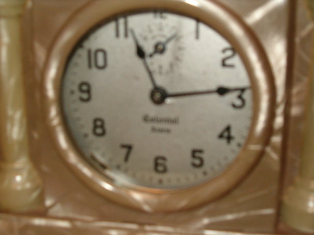 Celluloid alarm clock