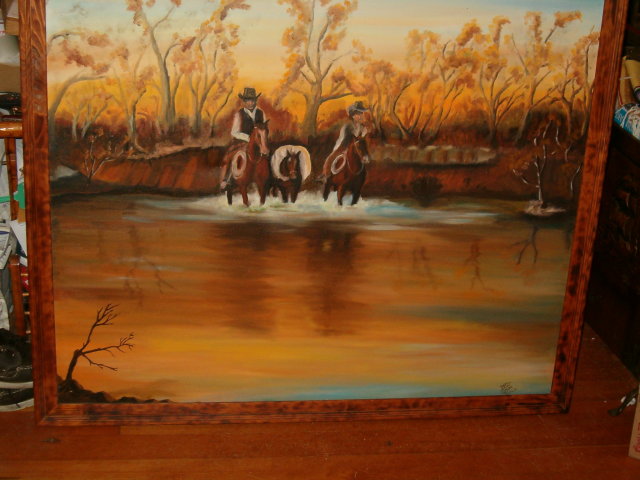 Western painting - cowboys crossing a river