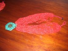 A ladies Multi strand Red Natural Coral and Turquoise Necklass