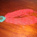 A ladies Multi strand Red Natural Coral and Turquoise Necklass
