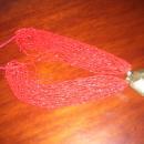 A ladies Multi strand Red Natural Coral and Turquoise Necklass