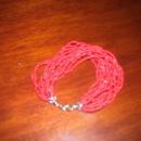 A ladies Multi strand Red Natural Coral Bracelet