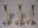 A vintage Trio set of Silver Deposit on Nickle Silver Candle Holders