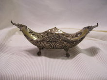 A Vintage 19 century silverplate four leg banana dish