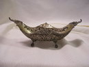 A Vintage 19 century silverplate four leg banana dish