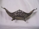 A Vintage 19 century silverplate four leg banana dish