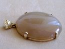 Yellow Jade Pendant-14 K Gold ( 17.2 ) Grams of Yellow Gold and Yellow Jade