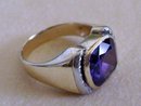 Man's Color Change Stone Chanel Set in 9.0 Grams of 10K Yellow Gold