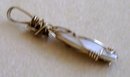 A Ladys Pearl Pendant wrapped in 14K Gold