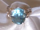 A Ladys-6.00cts Blue Topaz/.03ct diamond/ 4.90 grams 14K White gold
