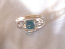 A Ladys-6.00cts Blue Topaz/.03ct diamond/ 4.90 grams 14K White gold
