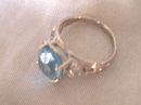 A Ladys-6.00cts Blue Topaz/.03ct diamond/ 4.90 grams 14K White gold