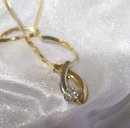 Ladys 14K Gold Diamond Pendant and Chain