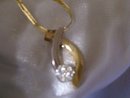 Ladys 14K Gold Diamond Pendant and Chain
